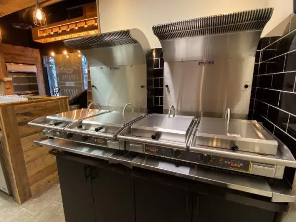 Equipex ventless hoods on countertop with panini grills